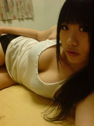 Young asian girl in little transparent..